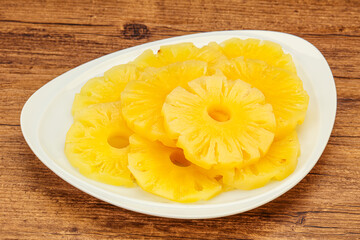 Marinated pineapple rings in the bowl