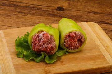 Raw stuffed pepper for cooking