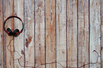 Earphones laying on a background