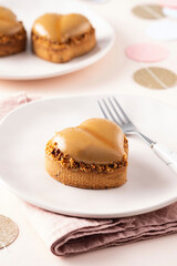 Heart shape vanilla tart with nuts. Valentine's Day.