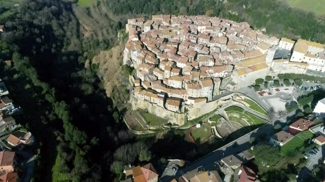 Aerial view of Farnese, A village in Viterbo, houses, roads and a landscape
