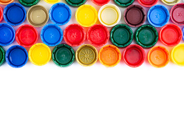 Plastic bottle caps background. Cap material is recyclable. Recycling collection and processing plastic bottle caps.