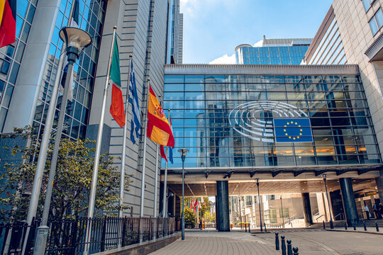 Brussels, Belgium - July 20, 2020: European Parliament offices and European flags.