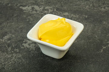 Natural cheese sauce in the bowl