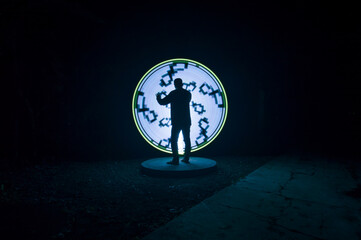 one person standing against beautiful White and yellow circle light painting as the backdrop