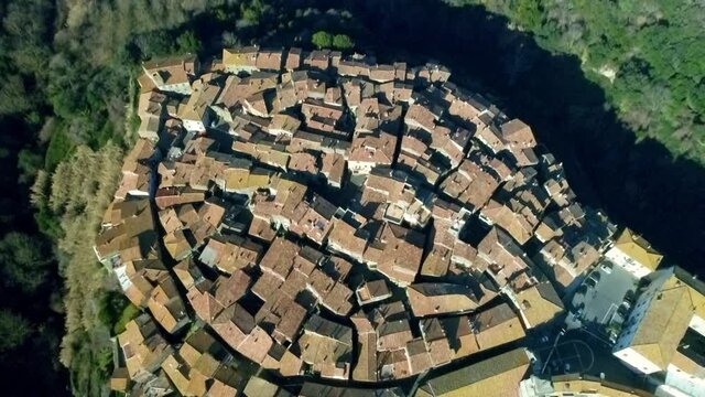 Aerial view of Farnese, A village in Viterbo, houses, roads and a landscape
