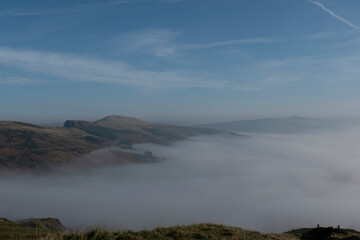 Hills of the Peak District with low clouds and mist