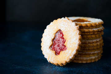 Traditional Austrian Linzer cookies with jam, homemade cakes, selective focus