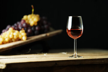 A glass of rose wine on the rustic table
