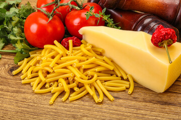 Italian pasta raw Maccheroni for cooking