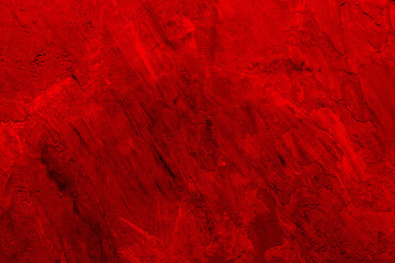 Red wall with dark spots and scratches