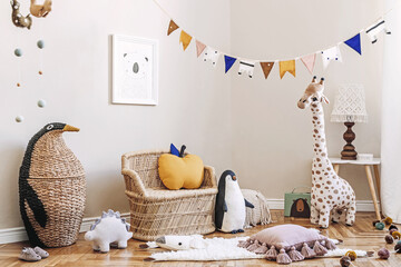 Stylish scandinavian interior of child room with mock up frame ,natural toys, hanging decoration,...