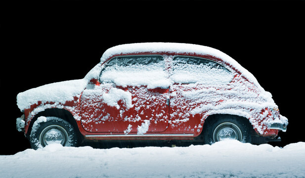 Milan / Italy - January 01, 2021: Fiat 600, Little Vintage Italian Car Covered With Snow In The Night.