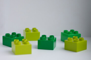 blocks. Children's constructor.Details are green on a white background.