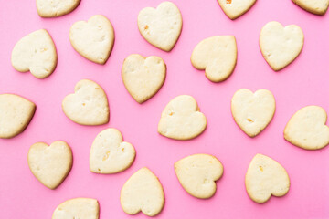 Happy valentines day 2021. Bakery. Heart shaped cookies on pink background