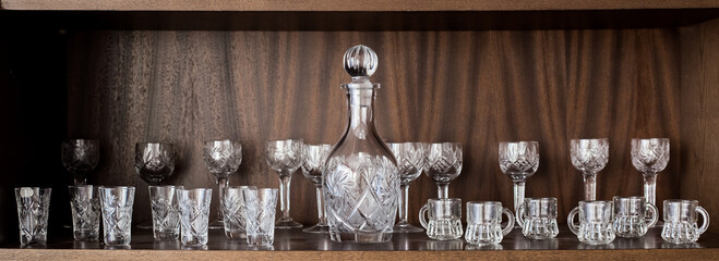 crystal set of different glasses on the shelf