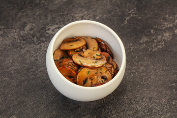 Roasted champignon with herbs and spices