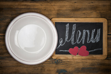 Word Menu on chalk board. Hand written. Copy space.