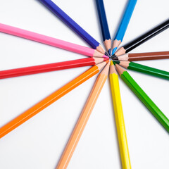 Fototapeta premium Multi-colored pencils on white background, palette of colors