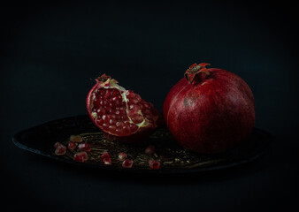 pomegranate on a black background