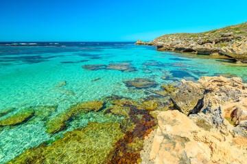 Rottnest Island, Western Australia. Panorama view from cliffs over tropical reef of Little Salmon Bay, a paradise for snorkeling, swimming and sunbathing. Tourism in Perth. Turquoise crystal clear sea