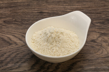 Wheat flour heap in the bowl
