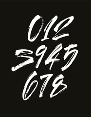Obraz premium vector set of calligraphic acrylic or ink numbers. ABC for your design, brush lettering on a black background