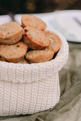 Pieces of bread lie in a basket in autumn in Altai