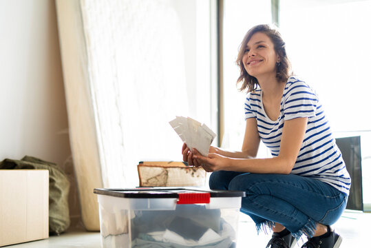 Young woman with colour samples