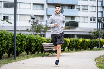 Young man jogging in park