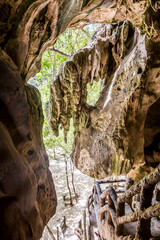 Stairs at the exit of the cave in Thailand jungles