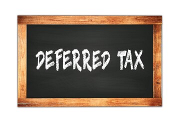 Fototapeta premium DEFERRED TAX text written on wooden frame school blackboard.