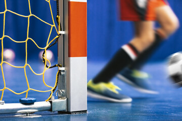 Indoor Soccer Goal - Close up on Square Goal Post. Futsal training for youth team. Young boy with...