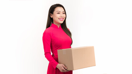 Asian woman with ao dai and hold big gift box wish have a happy new year