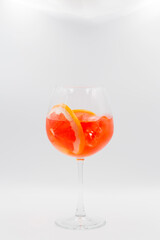 Yellow alcoholic cocktail on white background