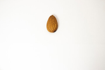 almonds on white isolated background with place for text
