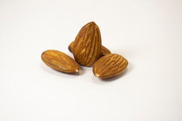 almonds on white isolated background