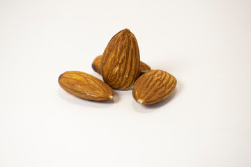 almonds on white isolated background
