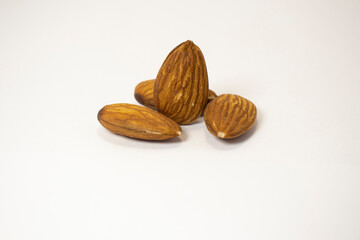 almonds on white isolated background
