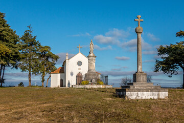 Church in the mountains with saint statue. Portuguese church in Torres Novas, Serra de Aire,...