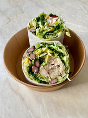 Healthy Organic Take Away Club California Chicken Wrap Sandwich Burrito in Plastic Box Container.