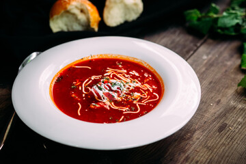 Ukrainian red borscht in a white plate