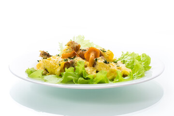 fried omelet with forest mushrooms chanterelles, on white background