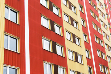 Bialystok city in Poland architecture background. High block of flats skyscraper living area. Old neighborhood. Retro style. Metal sheet elevation.