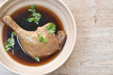 boiled duck leg in black soybean sauce dipping spicy chili sauce