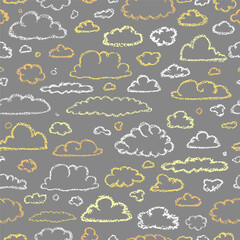 Chalk clouds pattern. Children drawing style cloud print. Hand drawn wax crayons art on grey backdrop. Chalk style isolated clouds background. White pastel crayons drawn clouds texture. Sky texture.

