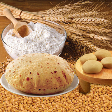 Rustic shot of a plate of chapati surrounded by ingredients