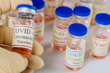 Coronavirus vaccine Sars-Cov-2 close up view of vaccine bottles