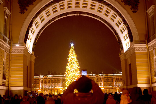 St. Petersburg, Russia - January 7, 2021: New Year and Christmas celebrations. The main Christmas tree on the palace square in St. Petersburg. Winter in Russia. 