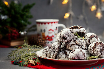 Home baked chocolate crinkle cookies in icing sugar. Cracked chocolate biscuits .